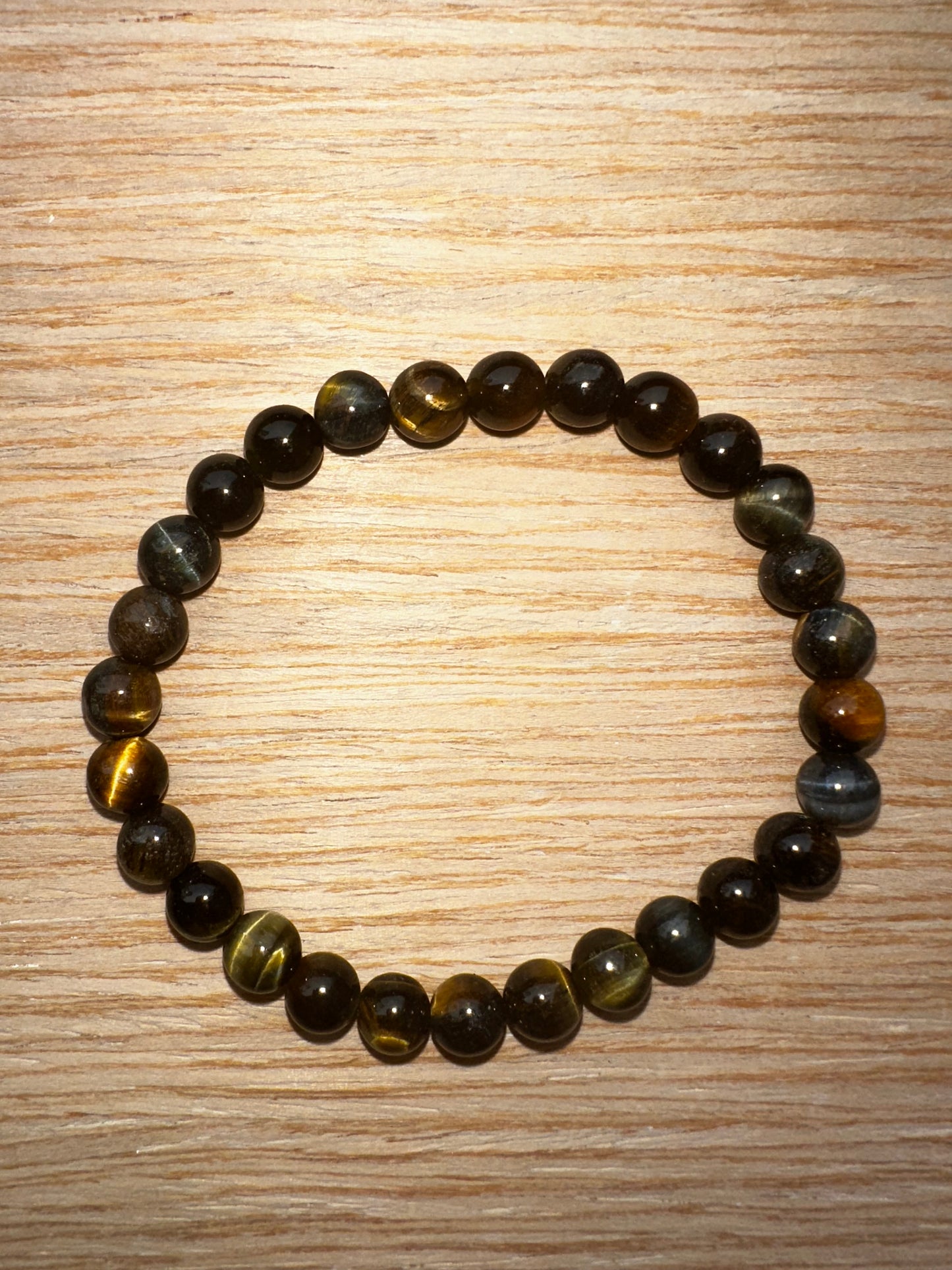 BRACCIALI OCCHIO DI FALCO PERLINE 6 mm